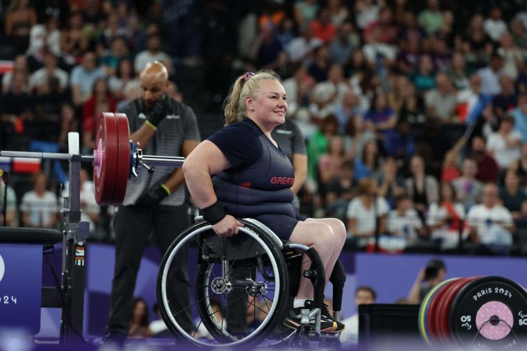 Para Powerlifter Louise Sugden in her wheelchair on the field of play at Paris 2024. credit: ParalympicsGB/Sam Mellish