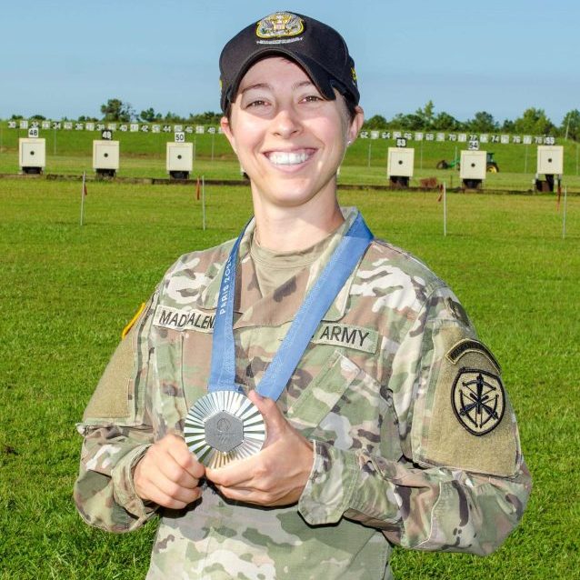SSG Sagen Maddalena on a shooting range, wearing her US Army uniform and Paris 2024 silver medal.